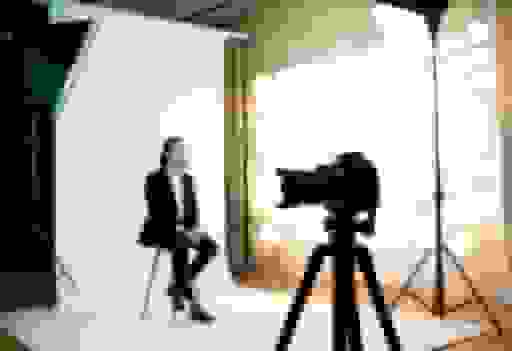 How to Take a Professional Headshot: The Complete Guide (DIY, Pro, and AI) cover image